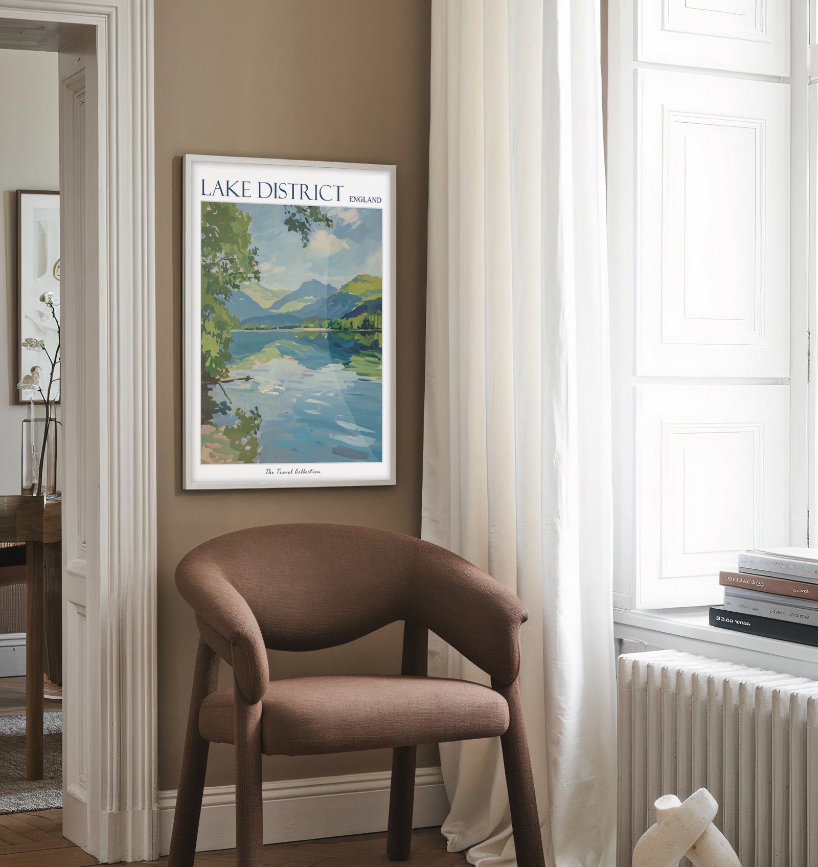 Lake District travel poster above a brown chair