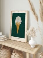 Cool Treats ice cream poster in a modern white frame, displayed on a light wall.