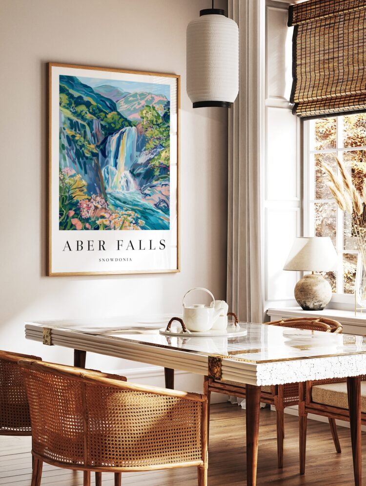 Aber Falls travel poster in a natural wood frame, enhancing a modern living room setting.