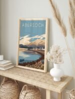 Abersoch travel poster in a white frame displayed on a minimalist wall.