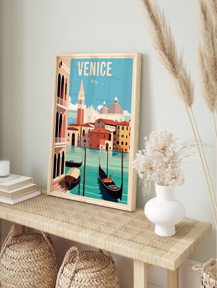 Venice Italy travel poster in a simple black frame, displayed prominently on a light wall.